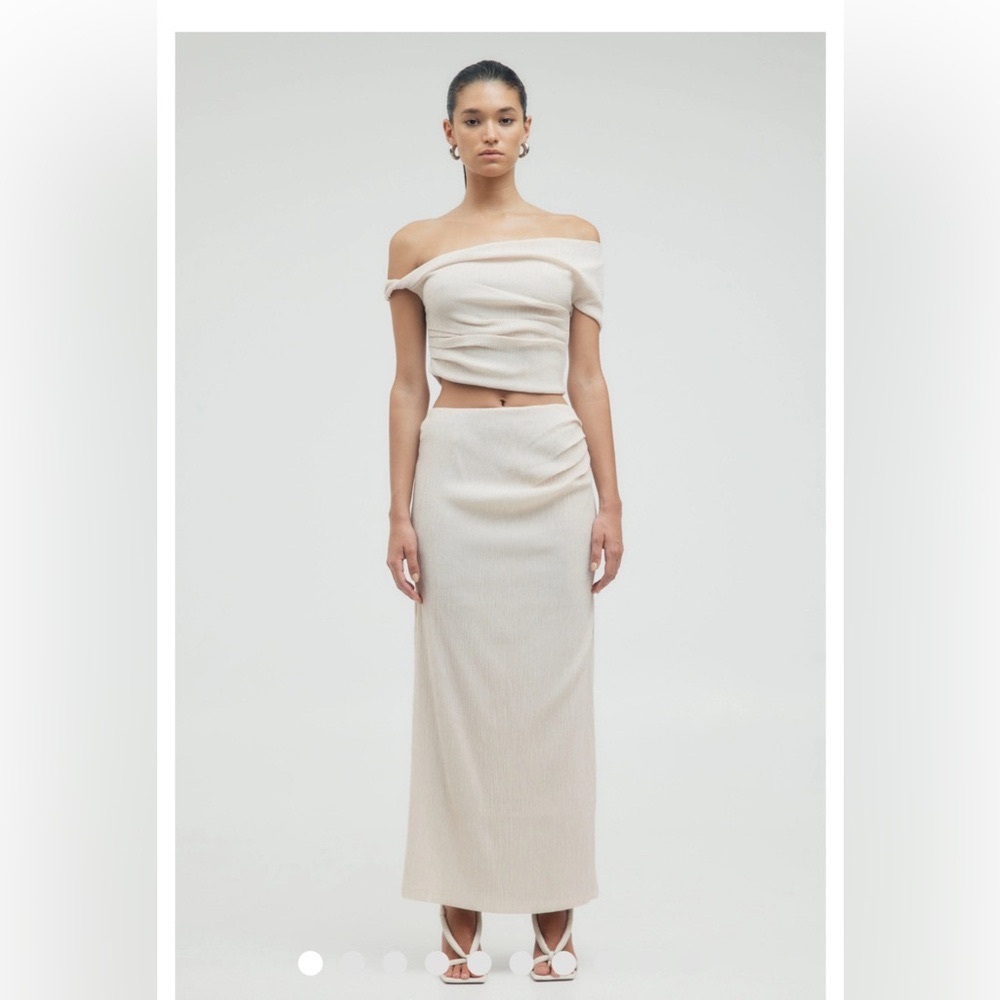 Two piece matching Third Form crop top and skirt.
